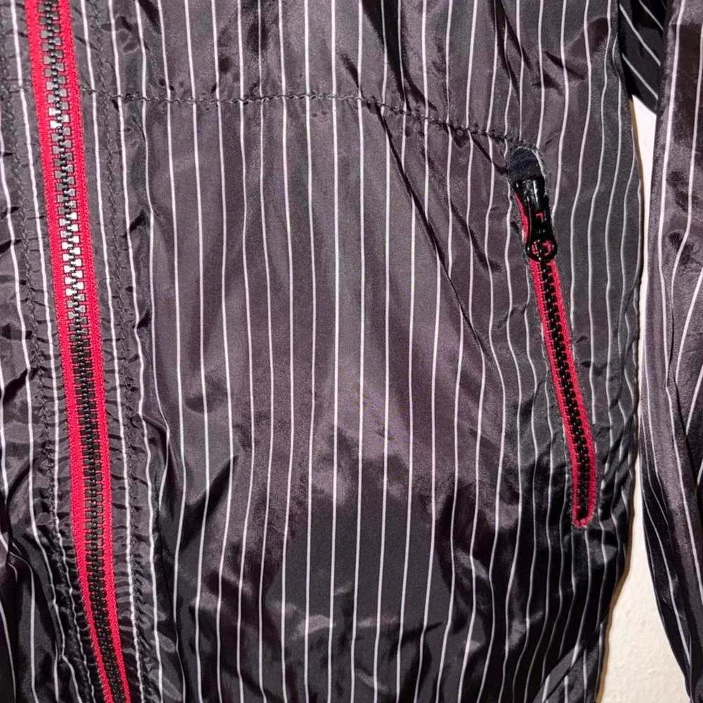 Old Navy black with white vertical pinstripe windbreaker jacket in a small
